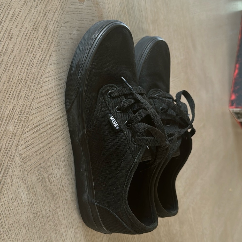 Vans black low top